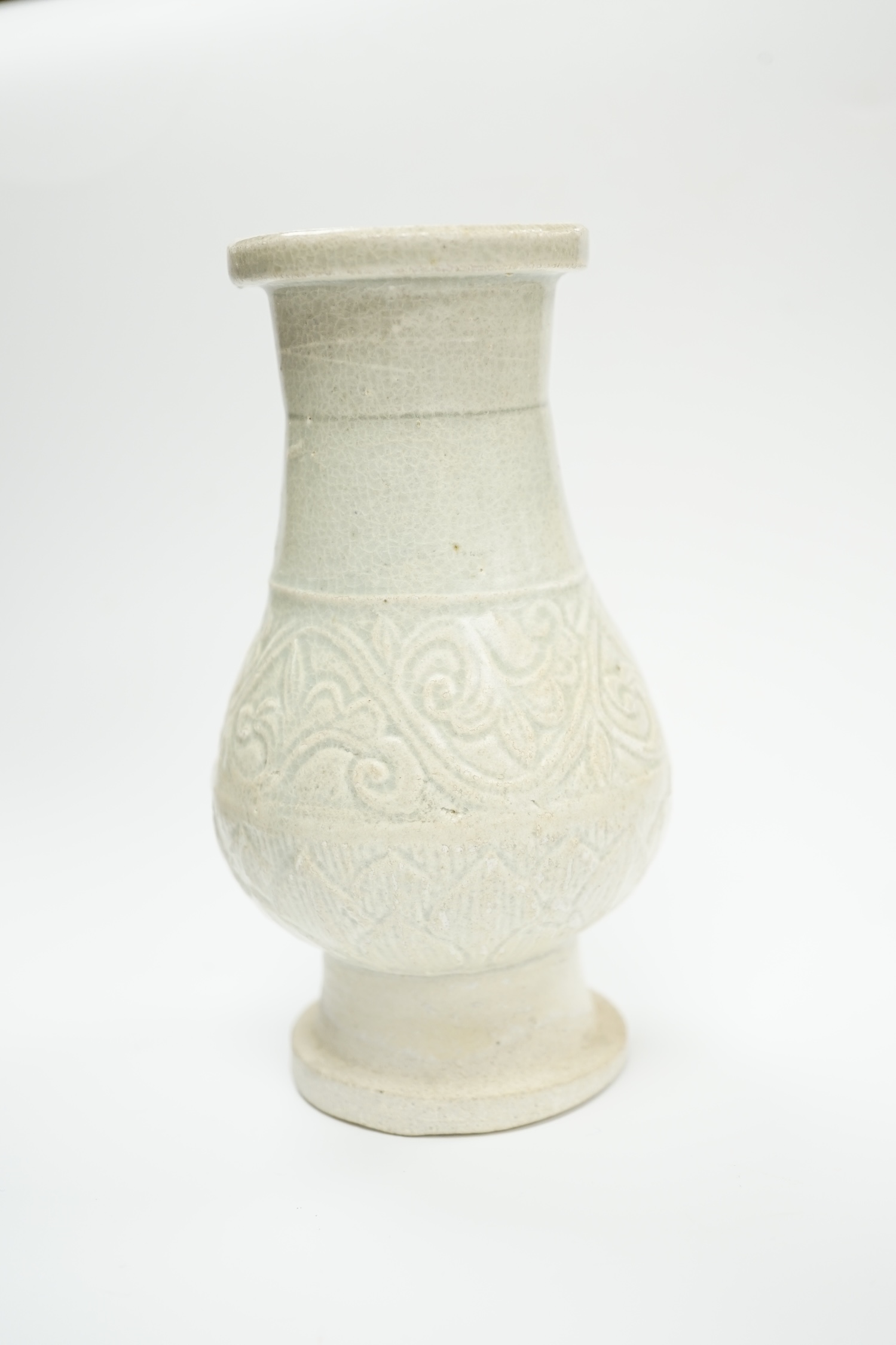 A Chinese moulded Qingbai vase, Song-Yuan dynasty, 14cm